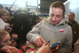 Na kanadyjskiej olimpiadzie Kowalczyk zdobyła trzy medale: złoty w biegu na 30 km, srebrny w sprincie i brązowy w biegu łączonym. 