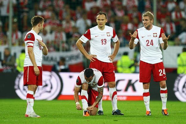 &nbsp; Damien Perquis (pierwszy z prawej), w środku Arkadiusz Głowacki, z lewej Jakub Błaszczykowski /AFP