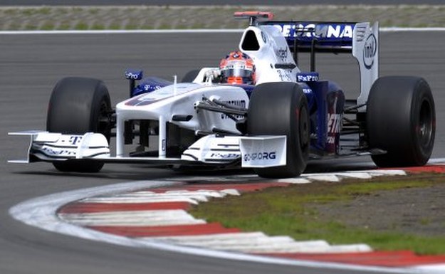 Za kierownicą Robert Kubica /AFP