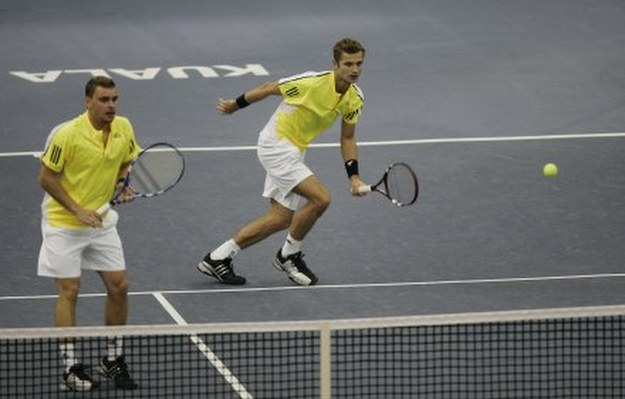 Marcin Matkowski (z lewej) i Mariusz Fyrstenberg /AFP