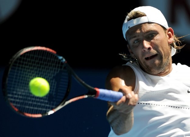 Łukasz Kubot (na zdjęciu) i Oliver Marach zmierzą się z polskim deblem /AFP