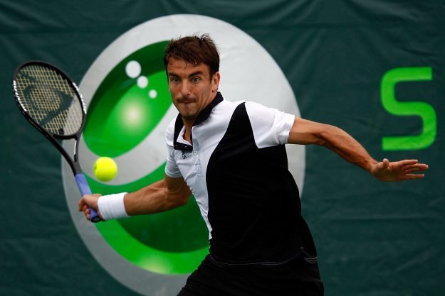 Tommy Robredo musiał pożegnać się z turniejem w Barcelonie /AFP