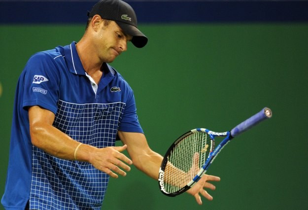 Andy Roddick skreczował na kortach w Szanghaju /AFP