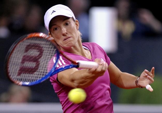 Justine Henin po raz drugi zmuszona jest do zakończenia kariery /AFP