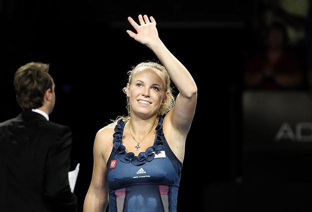 Caroline Wozniacki pozdrawia kibiców na kortach w Kopenhadze /AFP