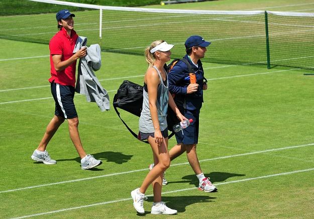 Organizatorzy Wimbledonu stają na głowie, by utrzymać dobry stan nawierzchni na kortach /AFP