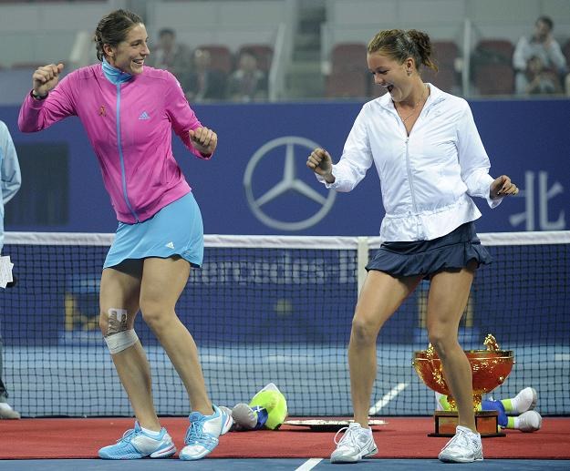 Andrea Petkovic po meczach prezentuje na korcie taniec, w Pekinie zaprosiła do niego Radwańską /AFP