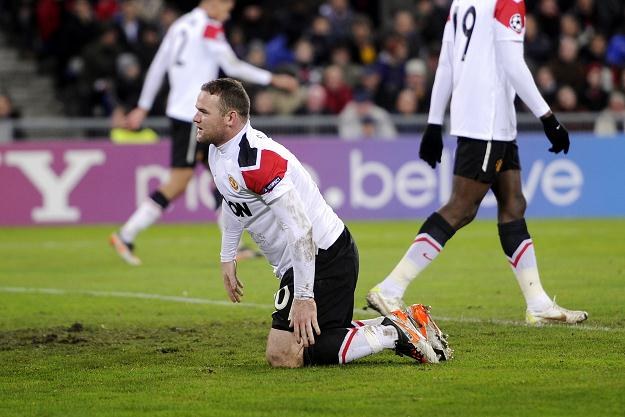 Wayne Rooney i jego koledzy nie popisali się w meczu z FC Basel /AFP