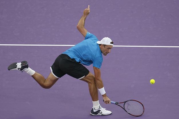 Łukasz Kubot podczas turnieju w Dausze /AFP