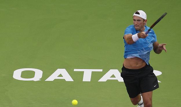 Łukasz Kubot podczas ostatniego turnieju w Katarze. /AFP