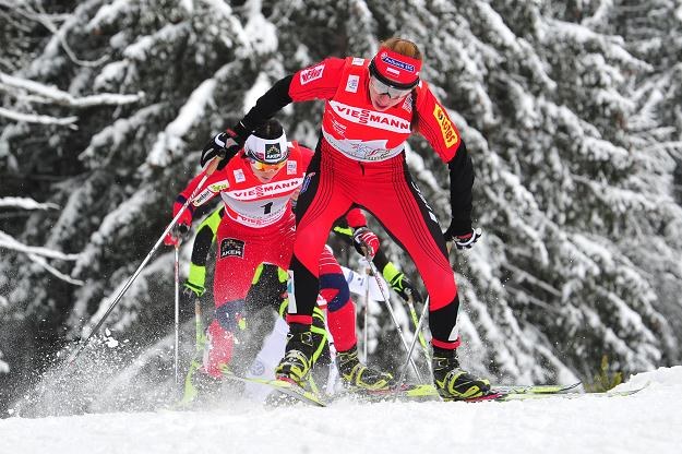 Justyna Kowalczyk ucieka Marit Bjoergen /AFP