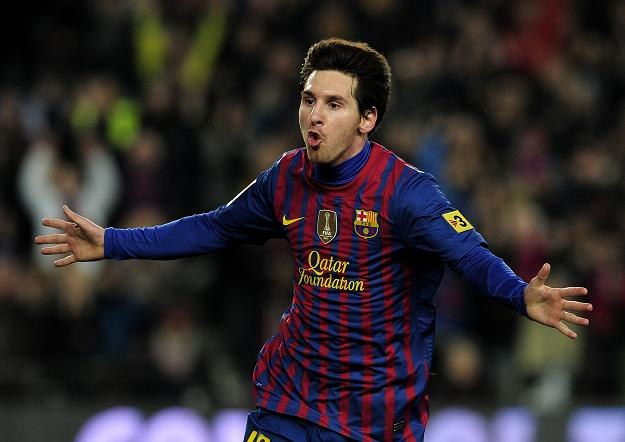 Lionel Messi  zdobył trzy gole w meczu Barcelony z Valencią. /AFP