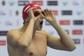 Konrad Czerniak przed startem w półfinale 50 m st. dowolnym