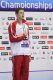 Konrad Czerniak na podium ze złotym medalem zdobytym na 50 m st. dowolnym