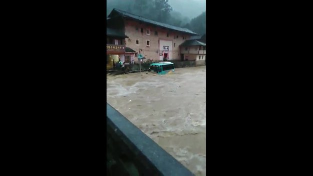 An amazing video has emerged from Zhangzhou, China of a bus being swept away by floodwaters. Filmed from a bridge on Monday, the footage shows the bus, which was parked outside a local business, being hit by torrents of floodwaters from a river which had burst its banks. The water lifts the bus and carries it away into the main channel of the river where is sinks. Fortunately, no-one was on board the vehicle and there were no reports of injuries.


