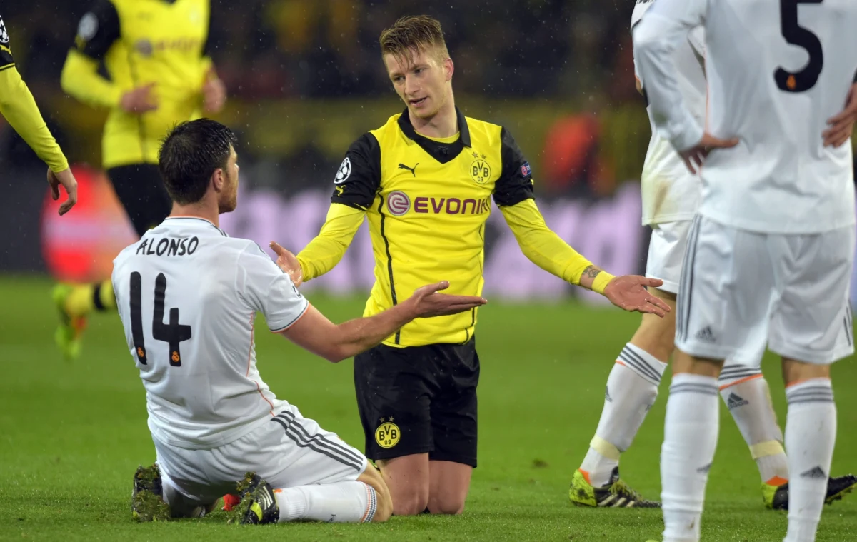 Piłkarze Borussii Dortmund - po porażce w Madrycie z Realem 0:3 - byli bliscy odrobienia strat w rewanżowym meczu ćwierćfinału Ligi Mistrzów, ale wygrali tylko 2:0. Oprócz hiszpańskiego zespołu awans wywalczyła Chelsea, po zwycięstwie 2:0 nad PSG.