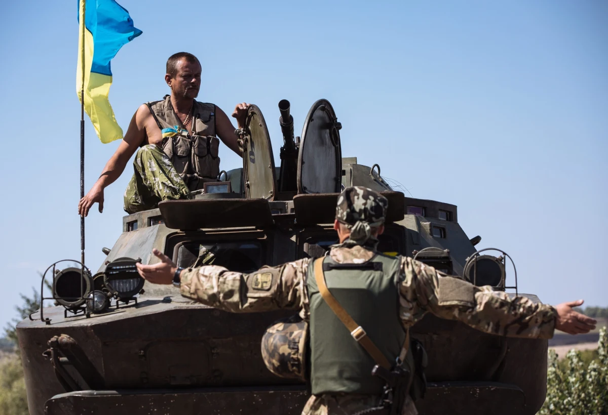 Nie ma stałego rozejmu w Donbasie na wschodzie Ukrainy. Prezydenci Ukrainy i Rosji rozmawiali jedynie o sposobie osiągnięcia zawieszenia broni. Służby prasowej Petro Poroszenki i Władimira Putina precyzują wcześniejsze doniesienia. "Rosja nie jest stroną konfliktu" - oświadczył rzecznik prezydenta Rosji.