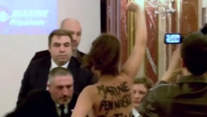 Nagi protest zakłócił konferencję Marine Le Pen