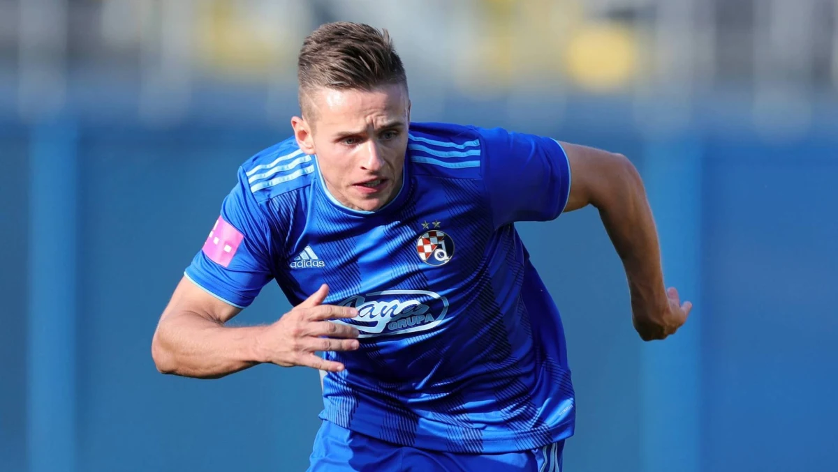 "Ciężko pracuję i się rozwijam. Cieszę się, że już drugi selekcjoner docenia moje umiejętności" - mówi dziennikarzowi RMF FM Patrykowi Serwańskiemu skrzydłowy Dinama Zagrzeb Damian Kądzior. Piłkarz, który dotychczas zagrał w reprezentacji Polski tylko raz, ma nadzieję, że powiększy ten dorobek podczas listopadowych meczów kadry. Jerzy Brzęczek powołał właśnie Kądziora na najbliższe zgrupowanie przed spotkaniami z Czechami i Portugalią.