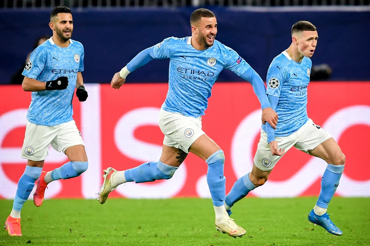 Real Madryt i Manchester City awansowały do półfinału piłkarskiej Ligi Mistrzów  W zakończonych w środę wieczorem meczach Real zremisował na wyjeździe z Liverpoolem 0:0, Manchester City pokonał na wyjeździe 2:1 Borussię Dortmund.