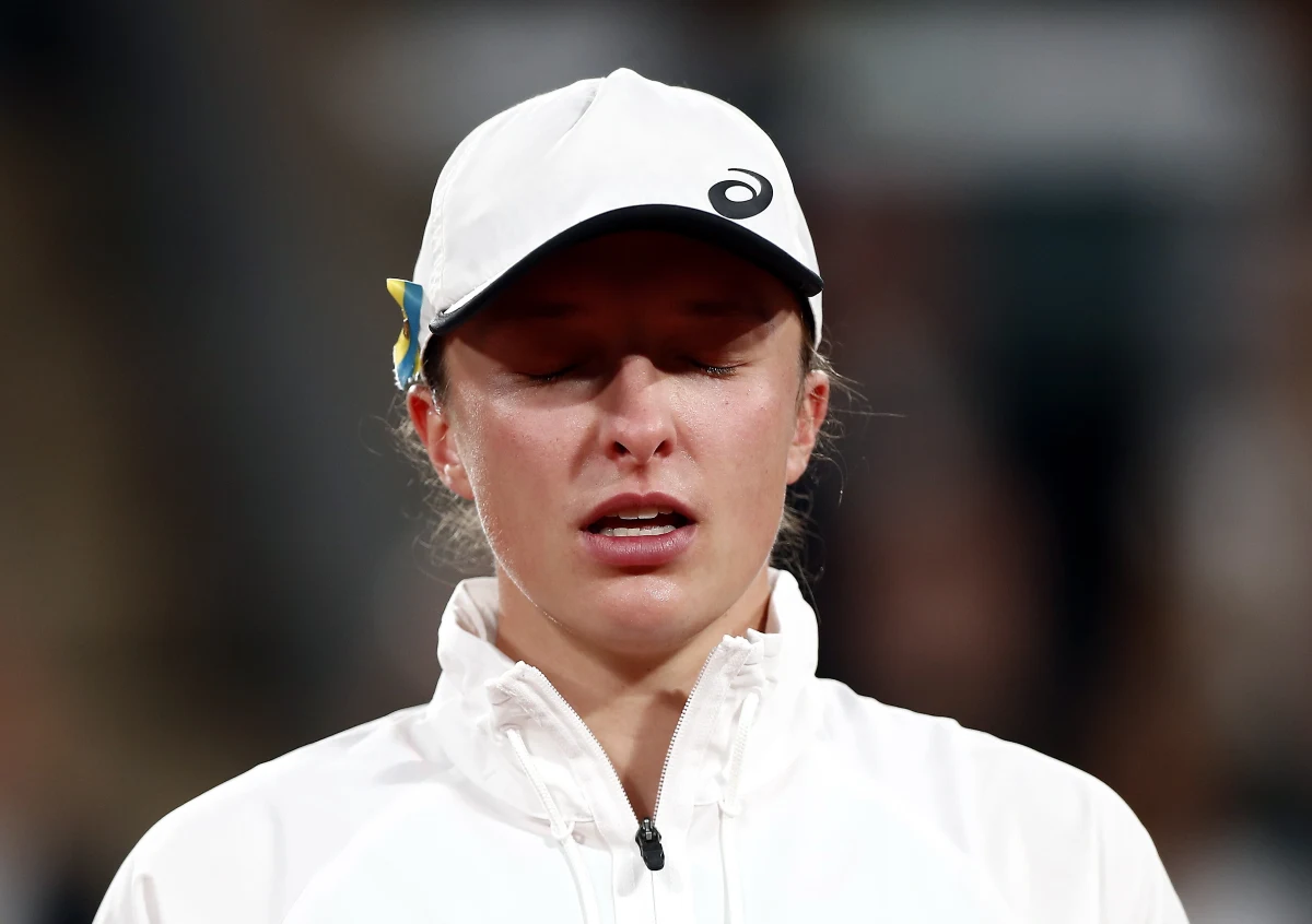 Po drugim w karierze triumfie we French Open Iga Świątek przyznała, że najtrudniejsze były dni między meczami i tęsknota za domem. "Cieszę się, że zrobię pranie i zobaczę swojego kota" - odpowiedziała na pytanie w jaki sposób zamierza się wynagrodzić za sobotni sukces.