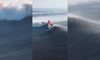 Windsurfer szaleje na fali. Robi wrażenie