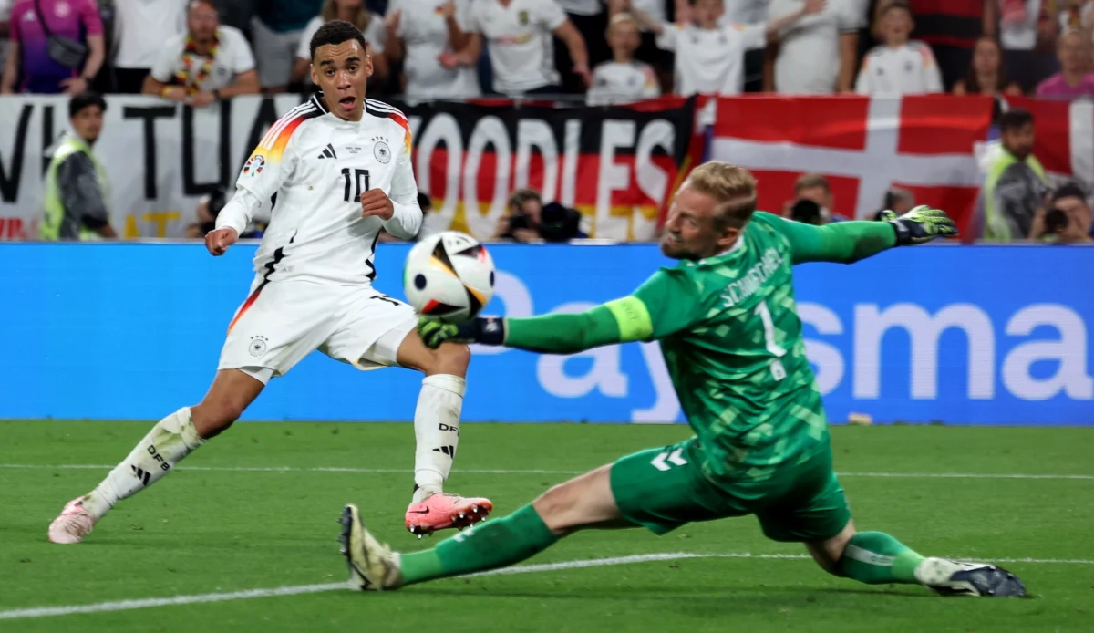 W tym meczu było wszystko - dwa gole, trzy nieuznane, multum okazji i gwałtowna burza, która doprowadziła do przerwania gry na prawie pół godziny. Niemcy w 1/8 finału Euro 2024 pokonali Duńczyków 2:0 i awansowali do ćwierćfinału. Ich rywala wyłoni niedzielne starcie Hiszpanów z Gruzinami.