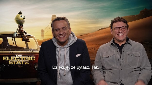 Joseph Russo i Anthony Russo, czyli słynni bracia Russo, w specjalnym wywiadzie dla Interii opowiadają o swoim najnowszym filmie "The Electric State". Twórcy hitów Marvela tym razem postawili na bardziej intymną historię drogi, pełną emocji i refleksji nad rodziną, samotnością oraz wpływem technologii na nasze życie. Czy technologia nam zagraża? Co chcą przekazać widzom? Jak wyglądała współpraca z Millie Bobby Brown i Chrisem Prattem? Jakie wyzwania stanęły przed reżyserami? Zapraszamy na rozmowę.