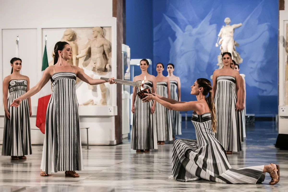 ​Nie w ruinach starożytnej świątyni Hery, jak zwykle, ale w skromniejszej ceremonii w Muzeum Archeologicznym w Olimpii zapłonął w środę olimpijski ogień, który 6 lutego posłuży do zapalenia znicza zimowych igrzysk w Mediolanie i Cortinie d'Ampezzo.