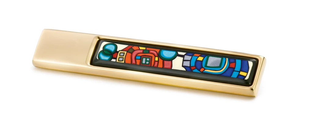 Zaklęte w biżuterii Frey Wille pełne kolorów spirale i drzewa, uchwycone na perłowym tle, nawiązują do jednego z najbardziej inspirujących dzieł Hundertwassera. Zaklęte w biżuterii Frey Wille pełne kolorów spirale i drzewa, uchwycone na perłowym tle, nawiązują do jednego z najbardziej inspirujących dzieł Hundertwassera.