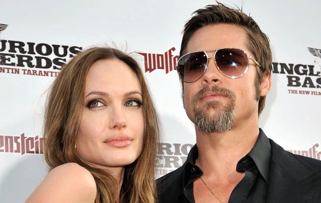 Angelina i Brad, fot. Kevin Winter