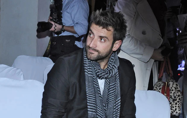 Maciek Dowbor na pokazie mody duetu Paprocki i Brzozowski. Maciek Dowbor na pokazie mody duetu Paprocki i Brzozowski.