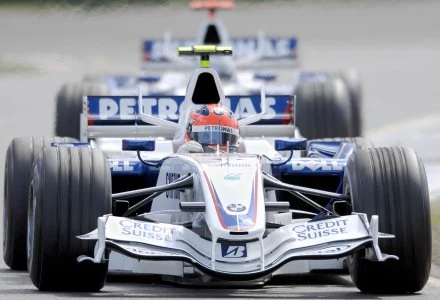 Robert Kubica, z tyłu Nick Heidfeld