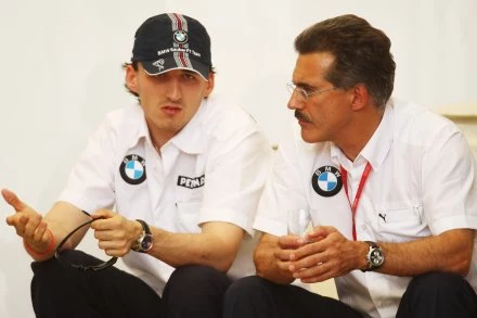 Robert Kubica (z lewej) ze swoim szefem Mario Theissenem/fot. Clive Mason