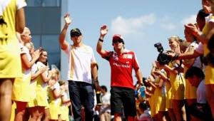 Robert Kubica w towarzystwie Fernada Alonso, który w tym sezonie zarobi najwięcej/fot. Paul Gilham