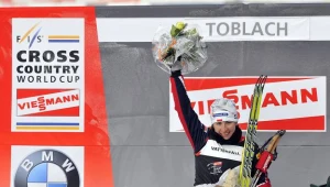 Justyna Kowalczyk na podium po biegu pościgowym/fot. Philippe Montigny