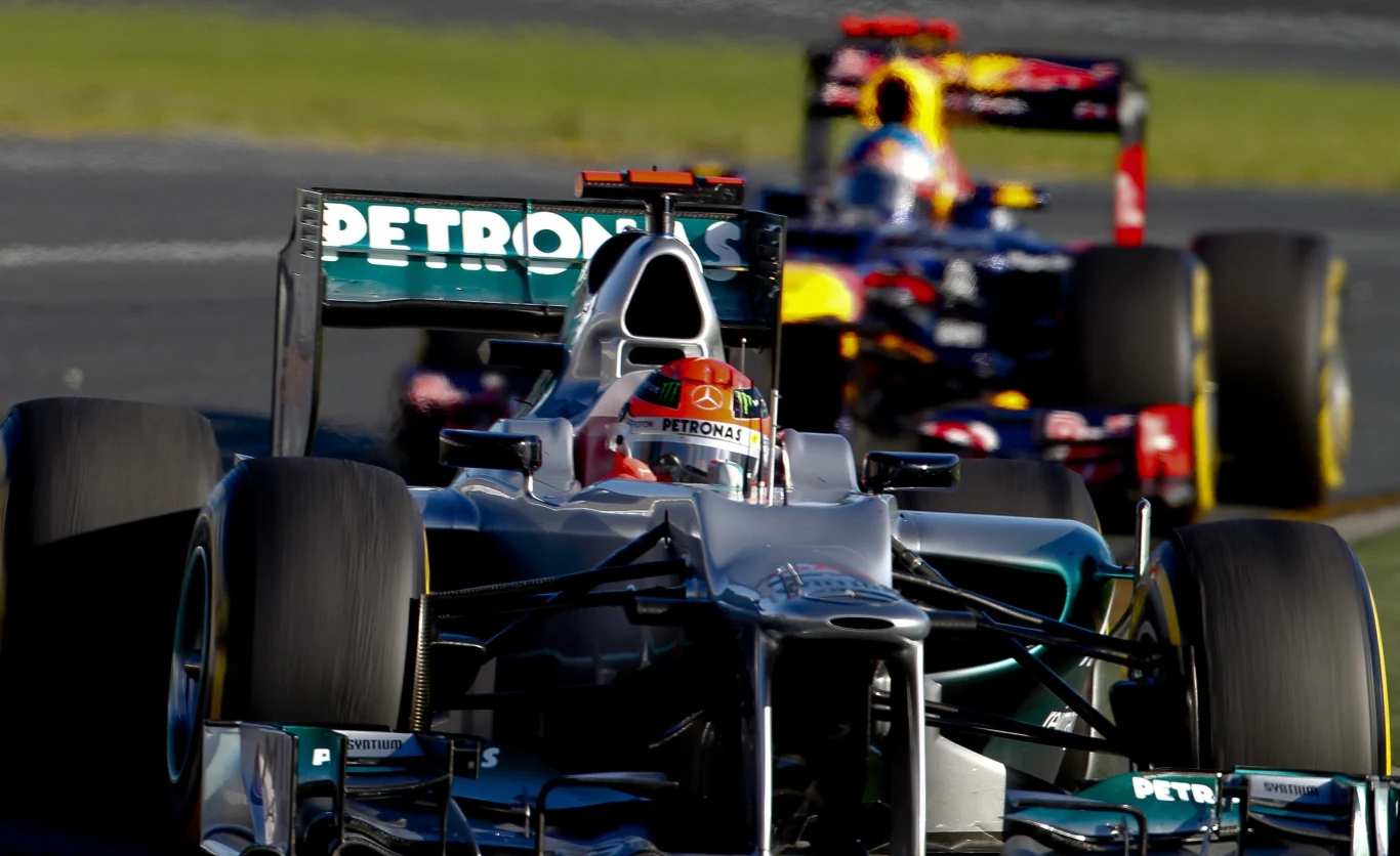 Michael Schumacher, a za nim Sebastian Vettel
