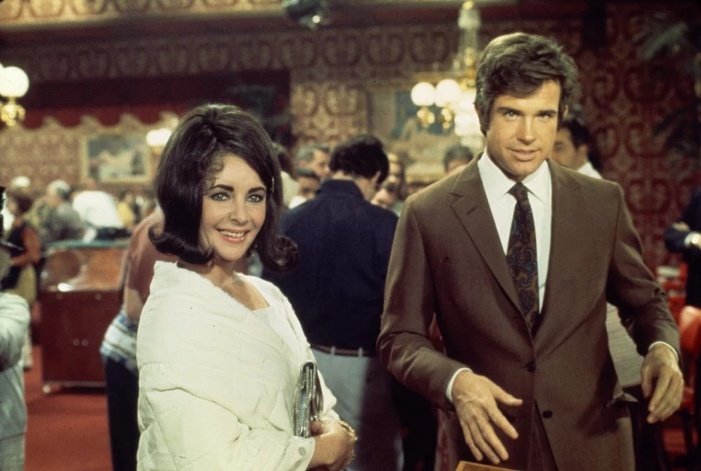 Warren Beatty. Biograf aktora wyliczył dokładnie, że Warren spał w swoim życiu z 12775 kobietami. Na zdjęciu Warren Beatty i Elisabeth Taylor Warren Beatty. Biograf aktora wyliczył dokładnie, że Warren spał w swoim życiu z 12775 kobietami. Na zdjęciu Warren Beatty i Elisabeth Taylor