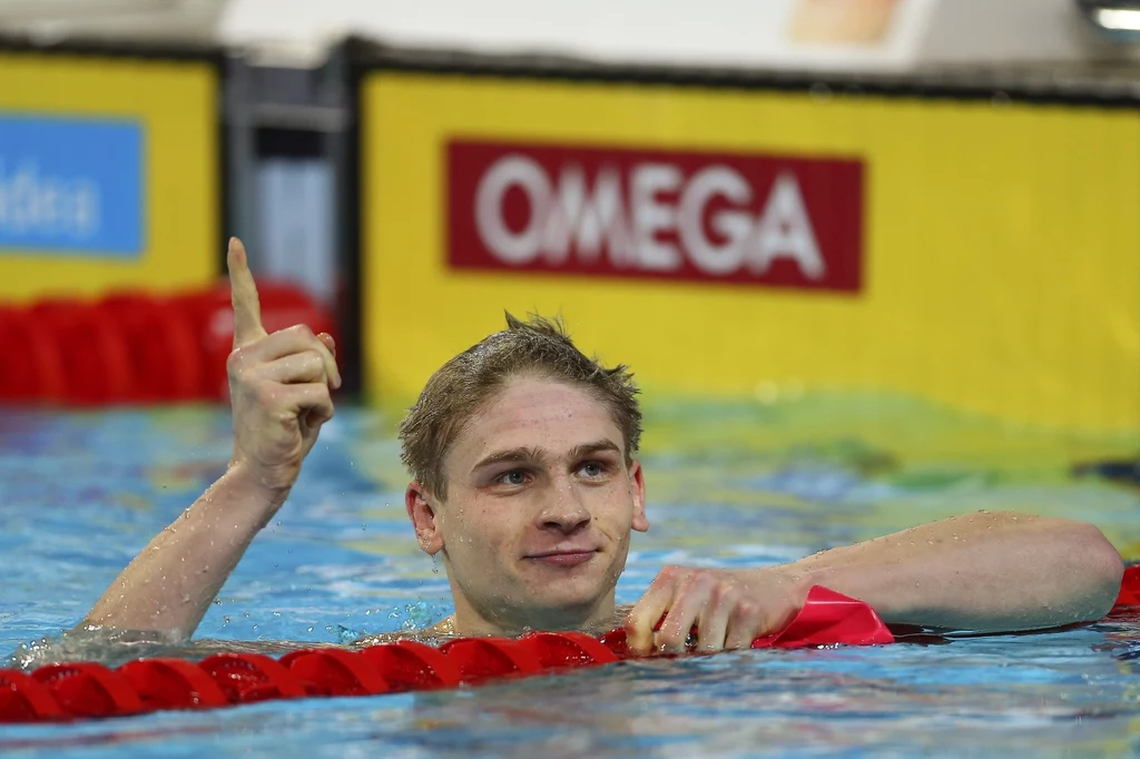Czasem 1.48,48 ustanowił rekord Polski. Słynnego Amerykanina Ryana Lochtego pokonał o zaledwie 0,02 s.