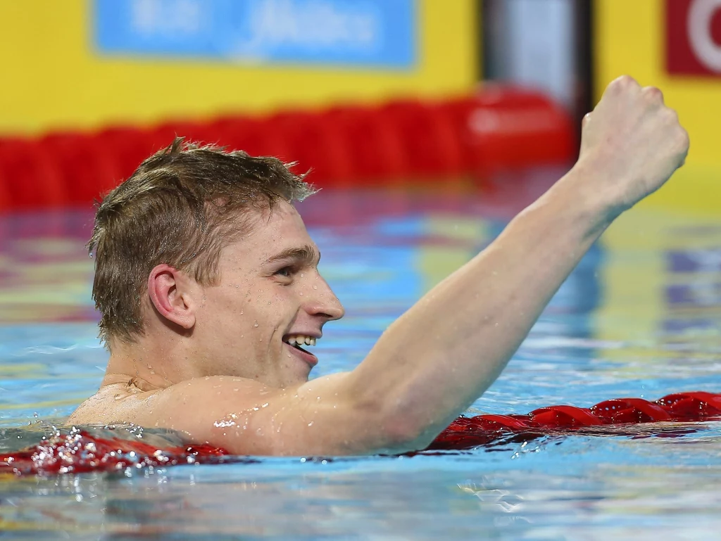 Czasem 1.48,48 ustanowił rekord Polski. Słynnego Amerykanina Ryana Lochtego pokonał o zaledwie 0,02 s.