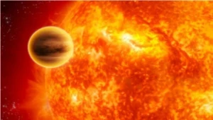 Planeta WASP 12b i jej gwiazda/fot. ESA, C. Carreau