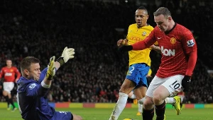 Wayne Rooney kontra Artur Boruc.