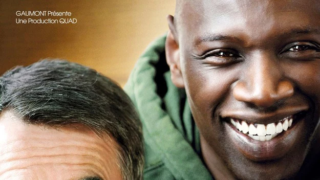 Omar Sy - plakat filmu "Nietykalni"