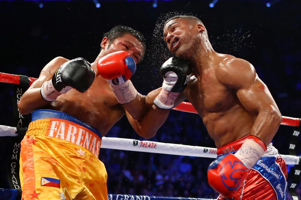 Yuriorkis Gamboa (z prawej) podczas walki z Michaelem Farenasem Yuriorkis Gamboa (z prawej) podczas walki z Michaelem Farenasem