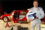 Mika Hakkinen i jego Mitsubishi Lancer WRC2