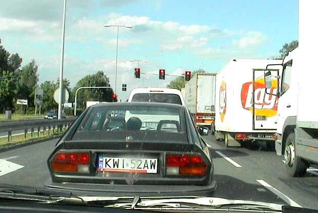 Kliknij