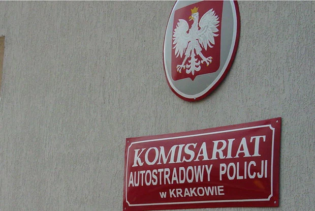 Kliknij