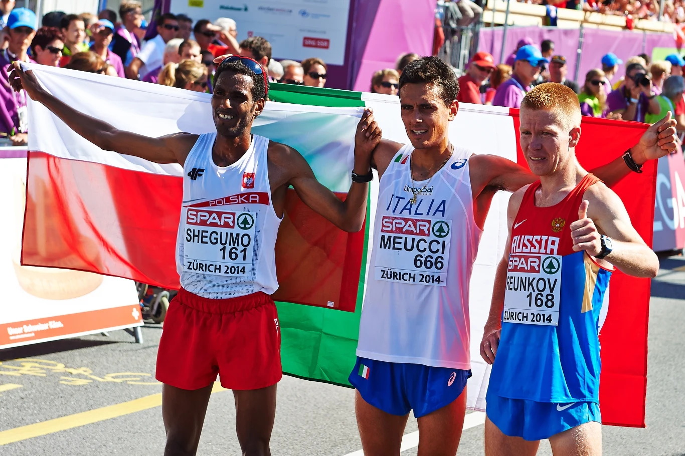 Reprezentant Polski Yared Shegumo (z lewej), Włoch Daniele Meucci (w środku), Rosjanin Aleksiej Reunkow (z prawej)