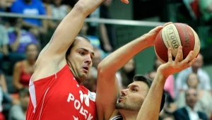 Szymon Szewczyk blokuje Austriaka Jozo Radosa