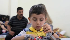 Rodzina chrześcijan, którym udało się uciec z Iraku do Jordanii